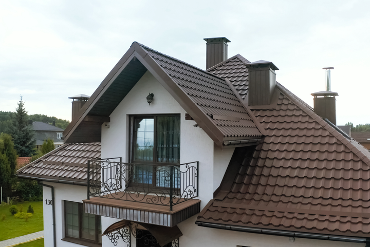 Country house with a new metal roof.