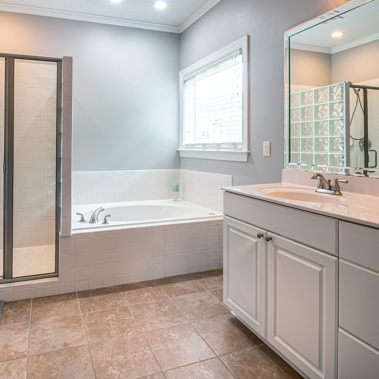 Photo of a bathroom room to show cabinets.