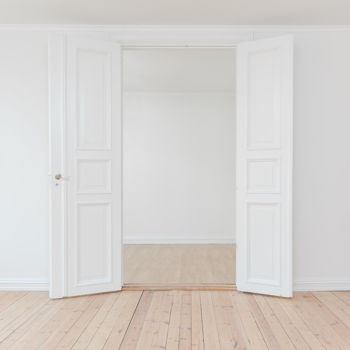 Photo of interior doors colored white.