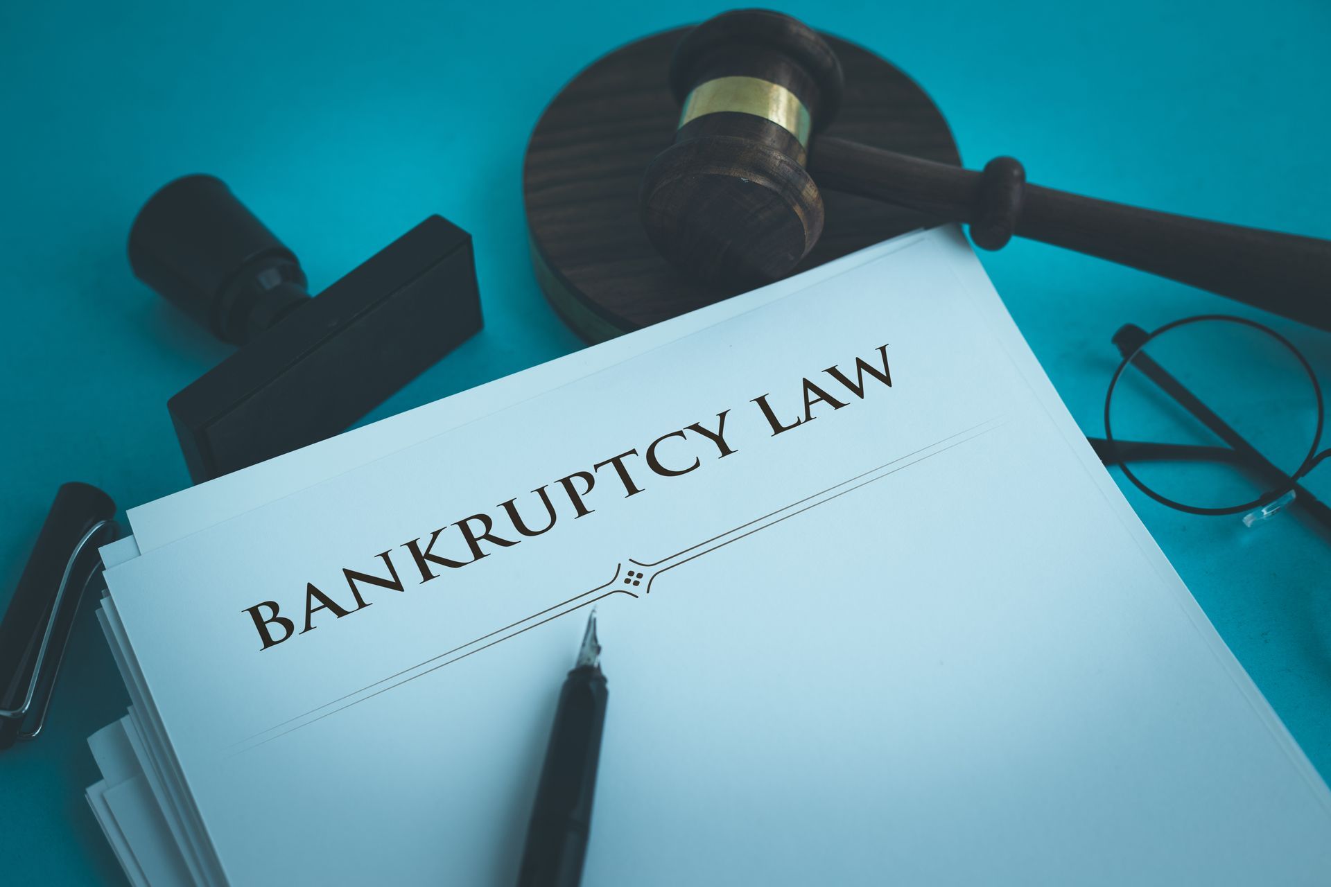 A piece of paper with the word bankruptcy law written on it.