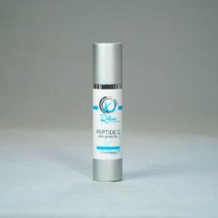 Silver and white skincare product bottle labeled 