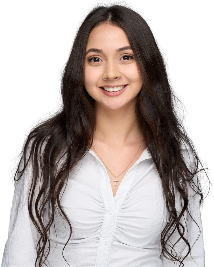 Smiling woman with long dark hair wearing a white top against a plain white background
