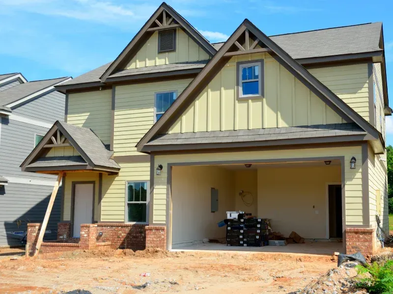 An image showing a team repairing a home's foundation.