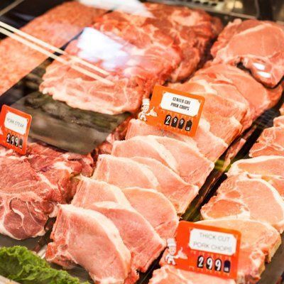 A display of pork chops in a butcher shop