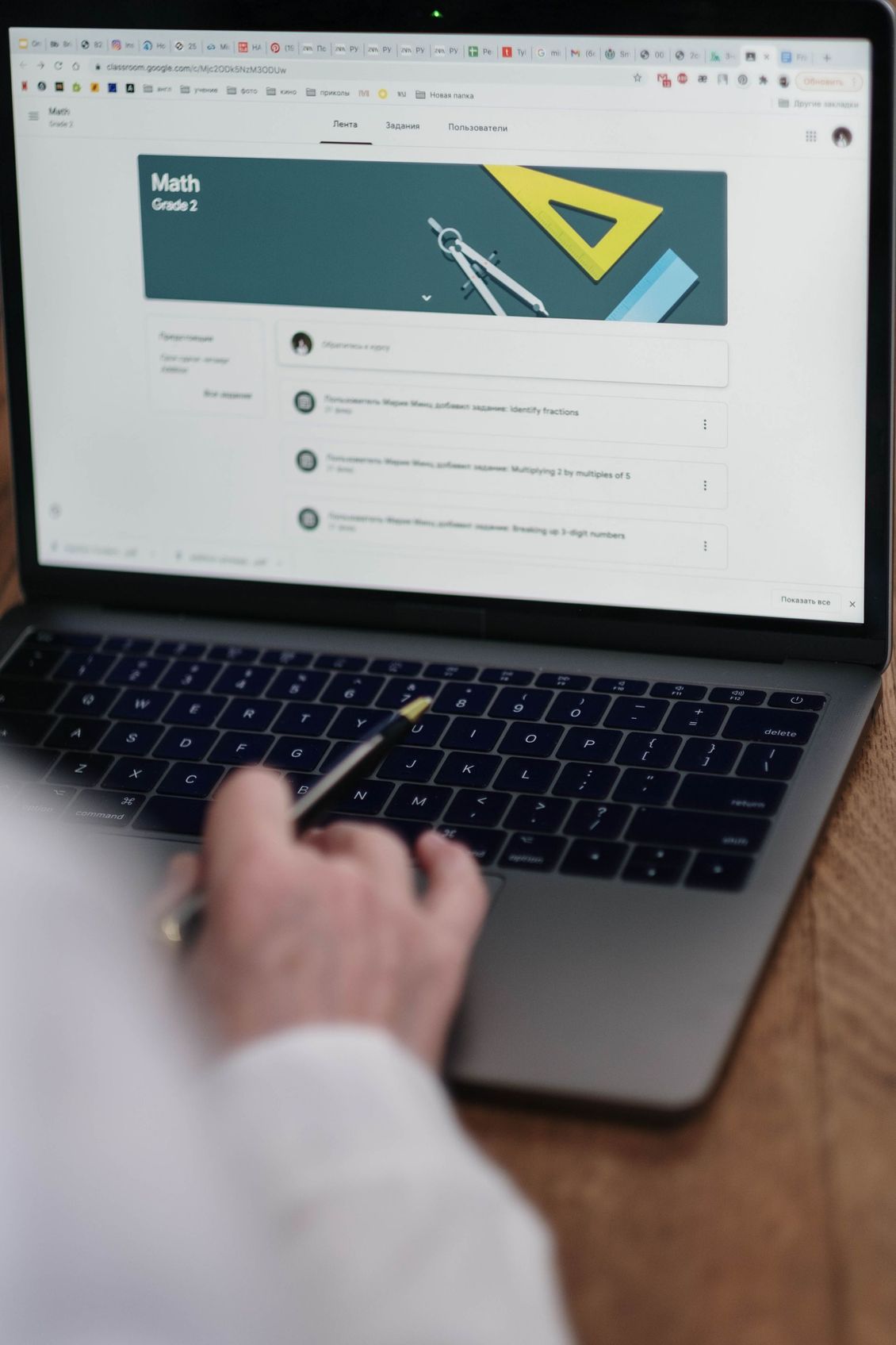 Hand by Computer accessing Ministry Content