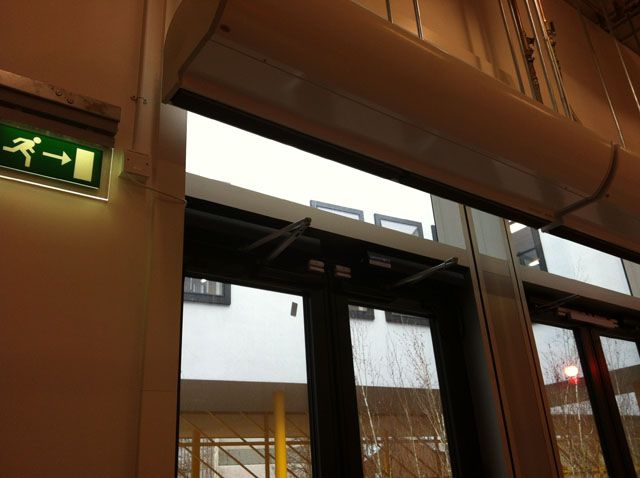 doors for office next to fire escape sign