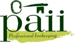 A green and yellow logo for a professional innkeeping company.