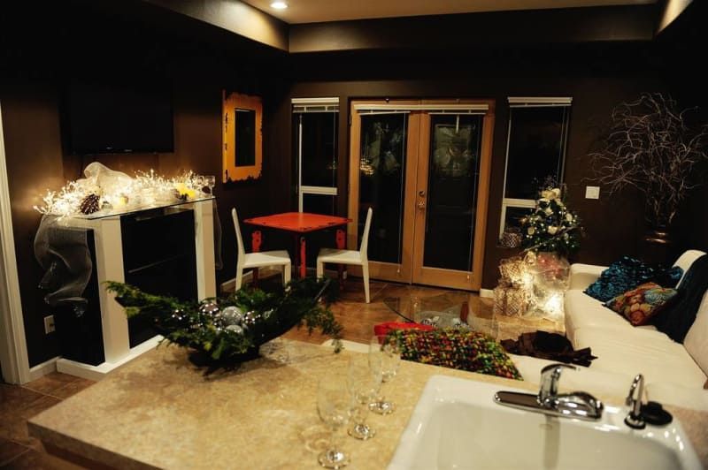 A living room with a fireplace and a bathtub