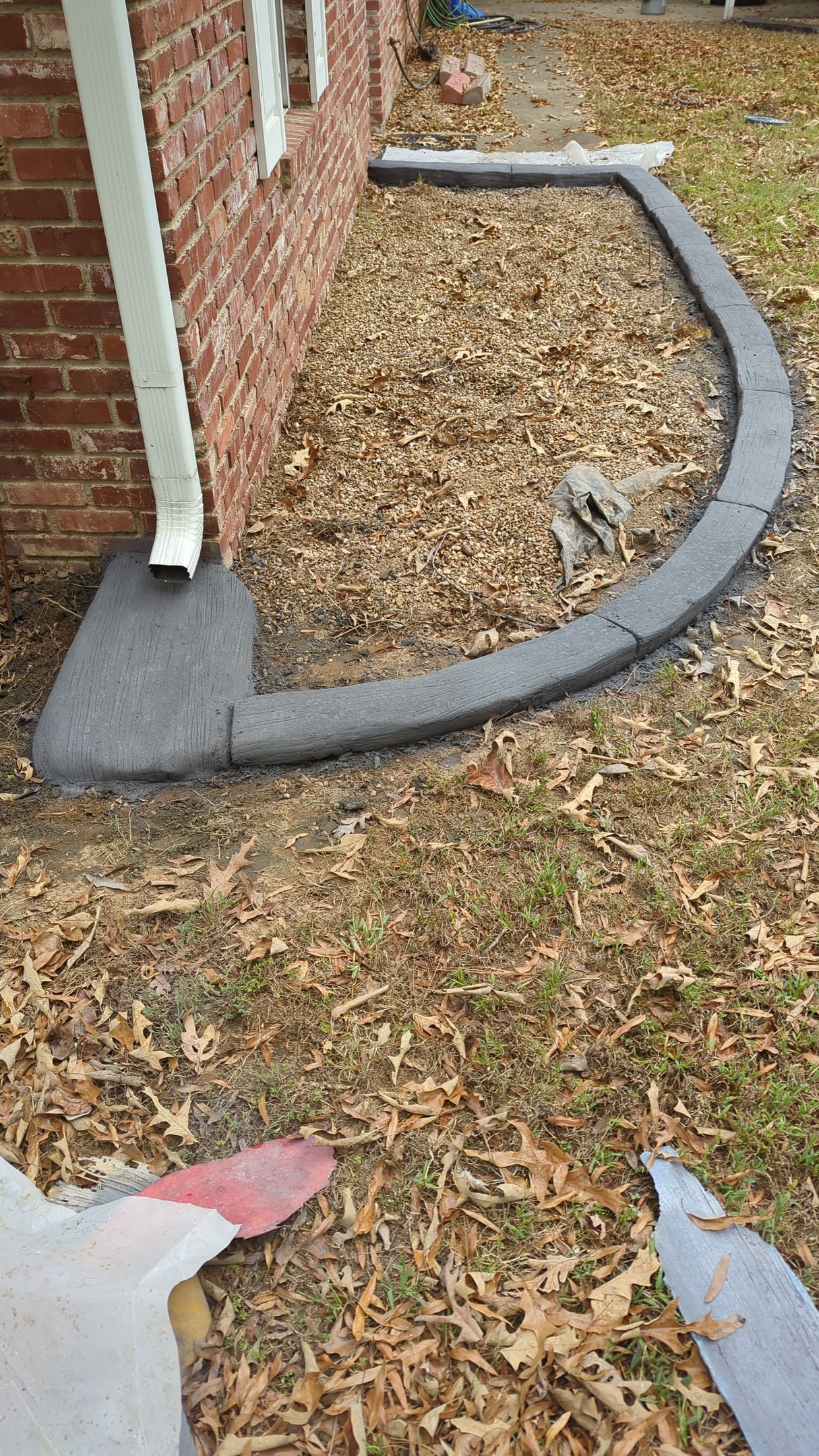 Gutter Splash Pad Moroccan Natural Stone Custom Stamped Edging Landscaping Garden Bed Home Residential The Curb Guy Marcus MrCurber Arkansas