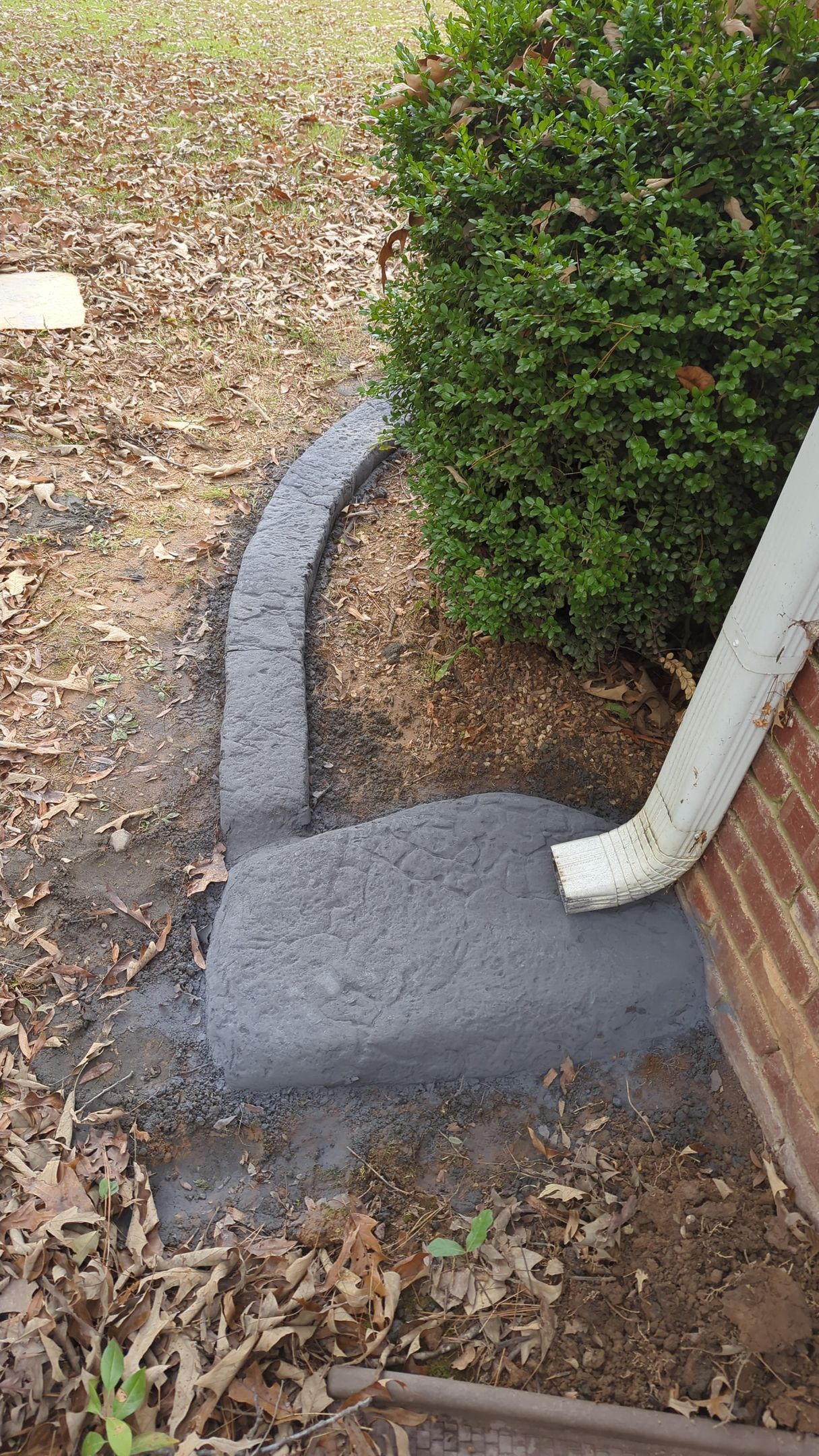 Gutter Splash Pad Moroccan Natural Stone Custom Stamped Edging Landscaping Garden Bed Home Residential The Curb Guy Marcus MrCurber Arkansas