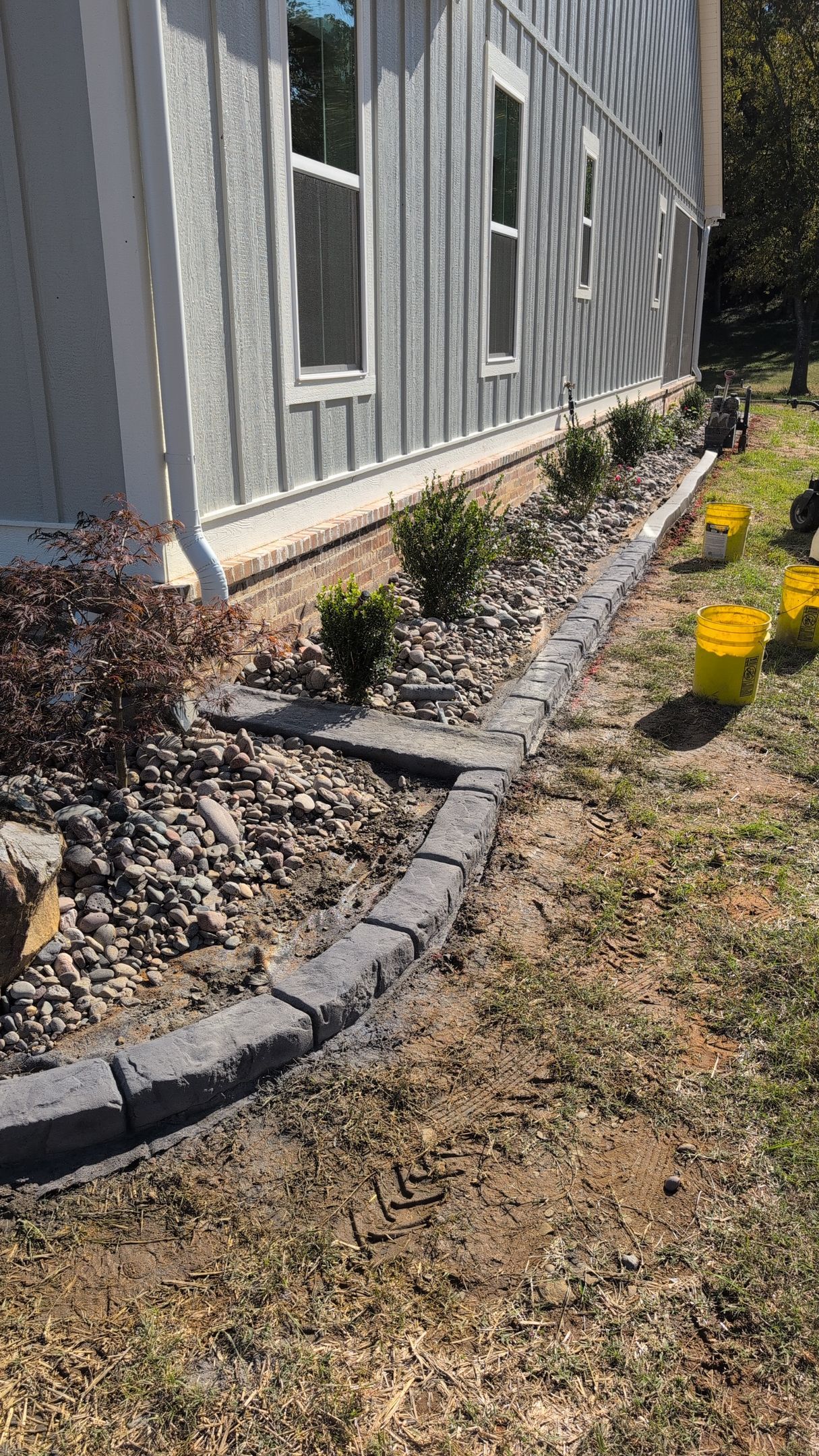 Gutter Splash Pad Moroccan Natural Stone Custom Stamped Edging Landscaping Garden Bed Home Residential The Curb Guy Marcus MrCurber Arkansas