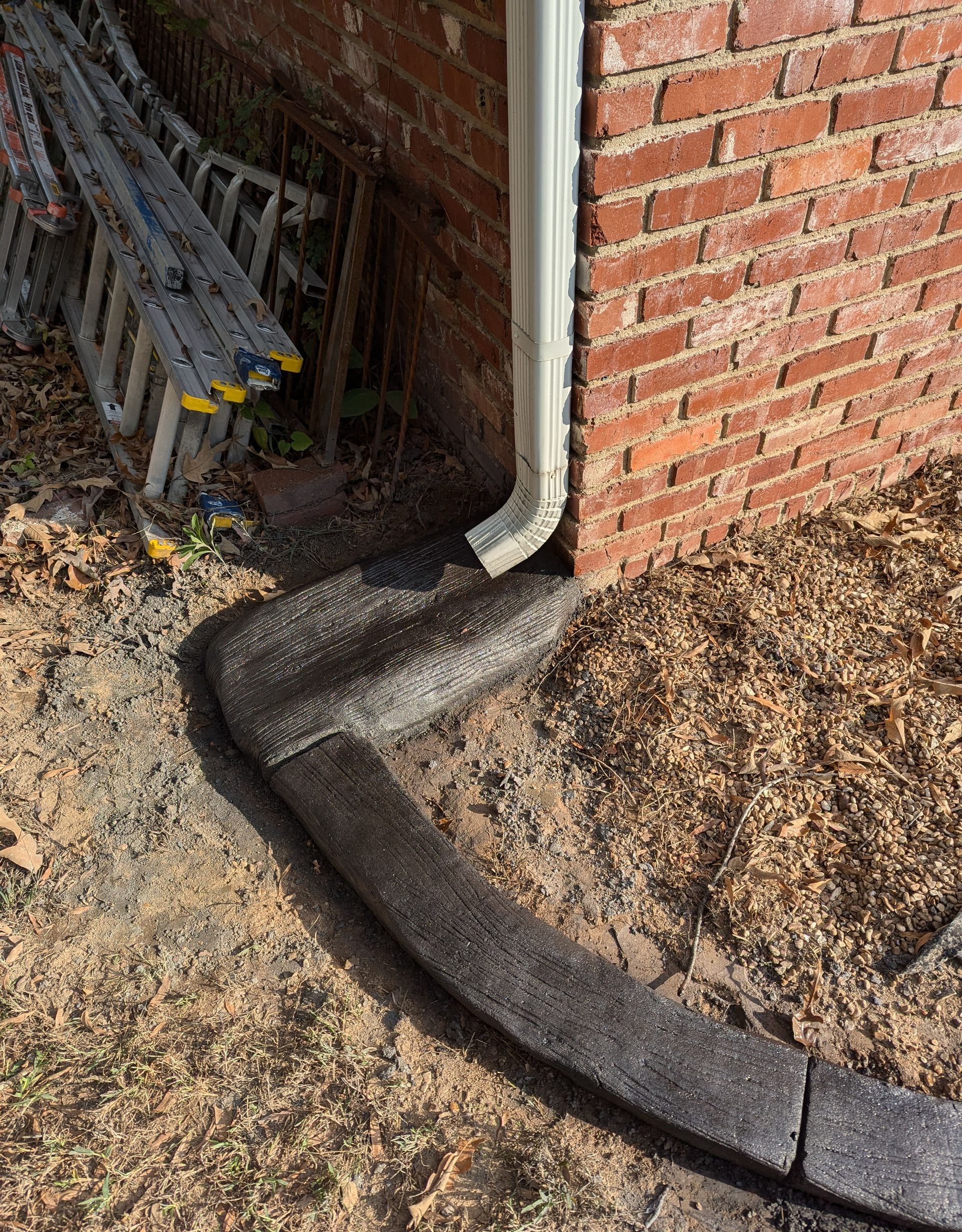 Gutter Splash Pad Moroccan Natural Stone Custom Stamped Edging Landscaping Garden Bed Home Residential The Curb Guy Marcus MrCurber Arkansas