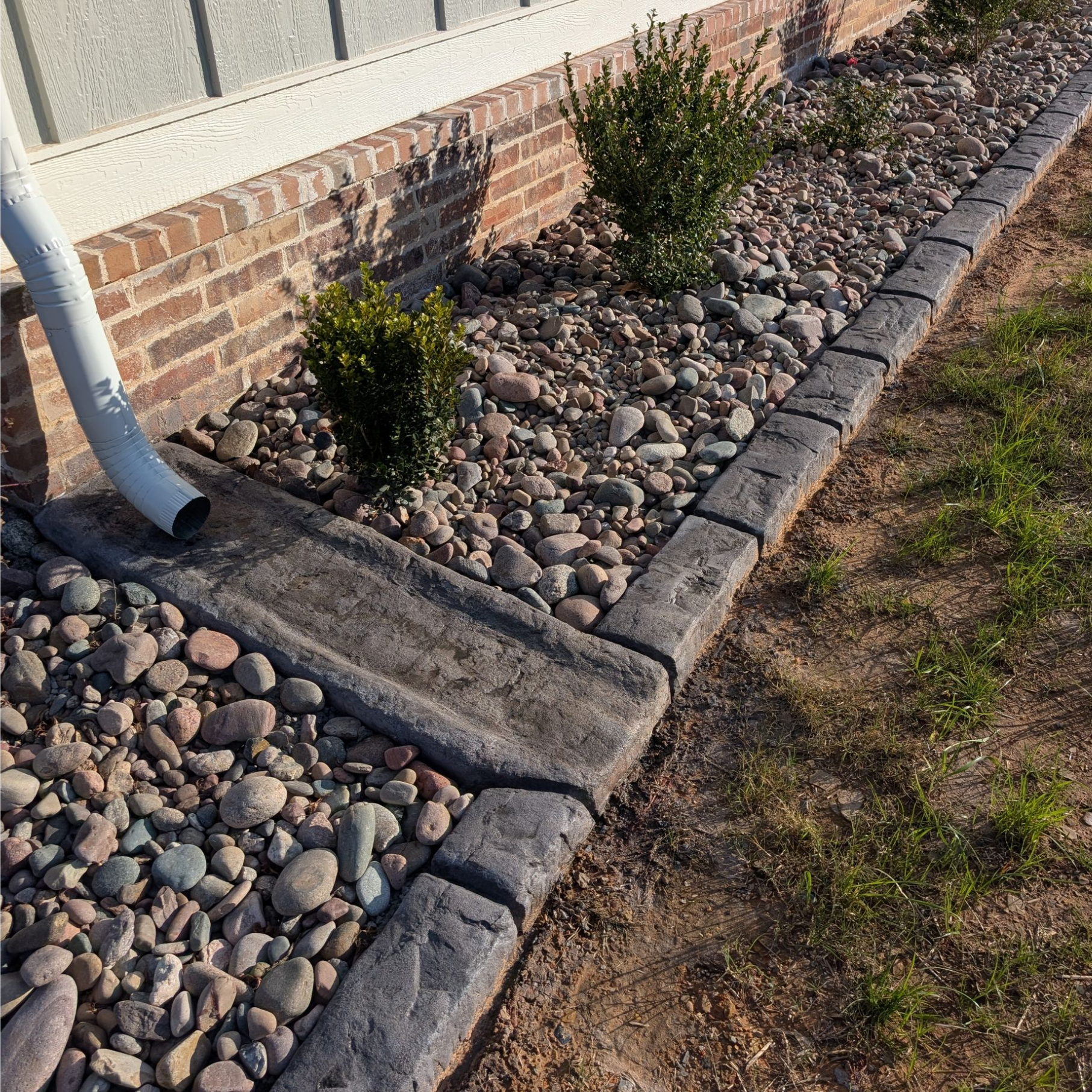 Gutter Splash Pad Moroccan Natural Stone Custom Stamped Edging Landscaping Garden Bed Home Residential The Curb Guy Marcus MrCurber Arkansas