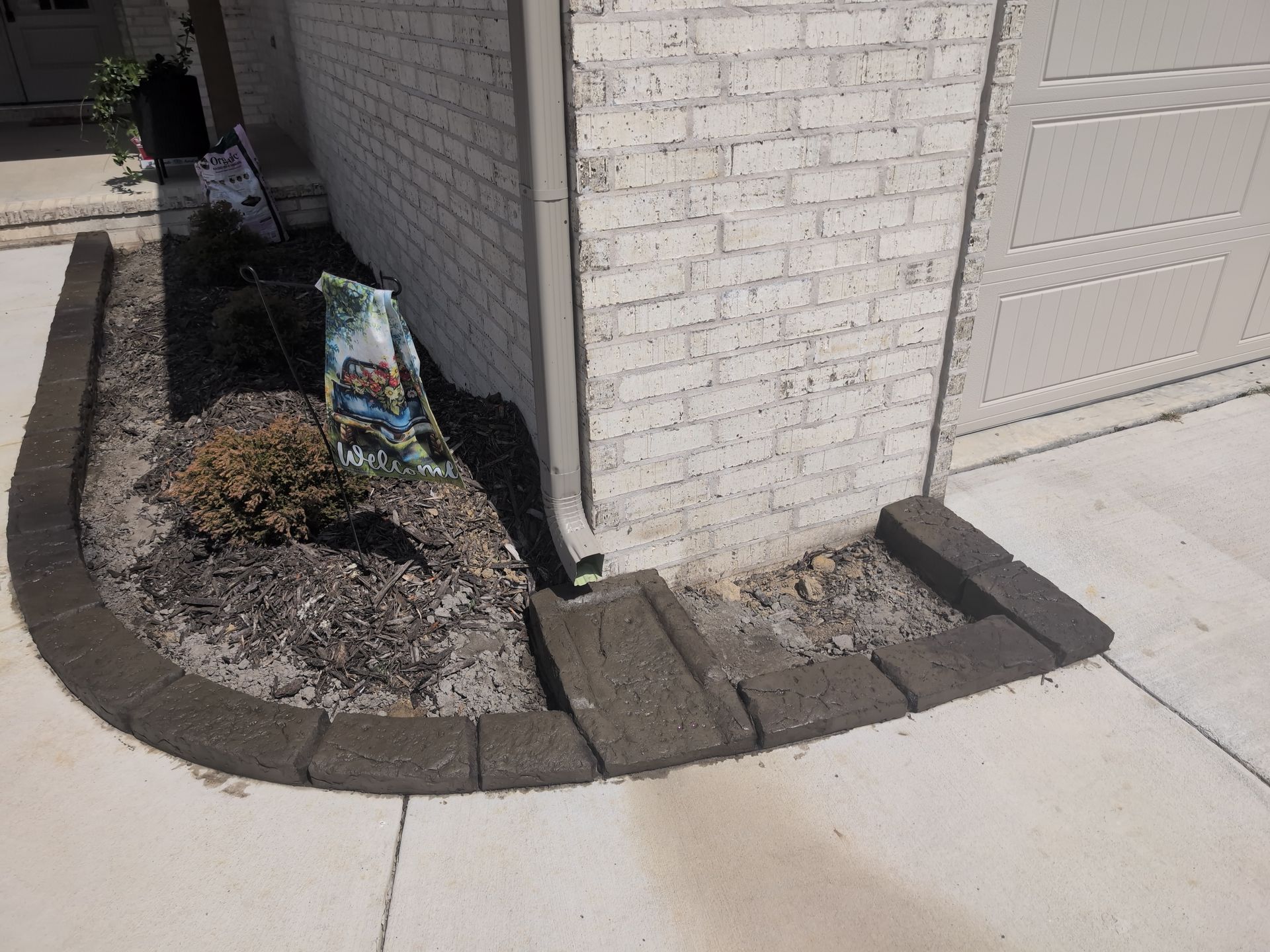 Custom Stamped Edging Gutter Splash Pad Garden Bed  Landscaping Home Residential The Curb Guy Marcus MrCurber Arkansas