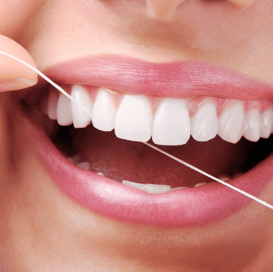 Floss at least once daily