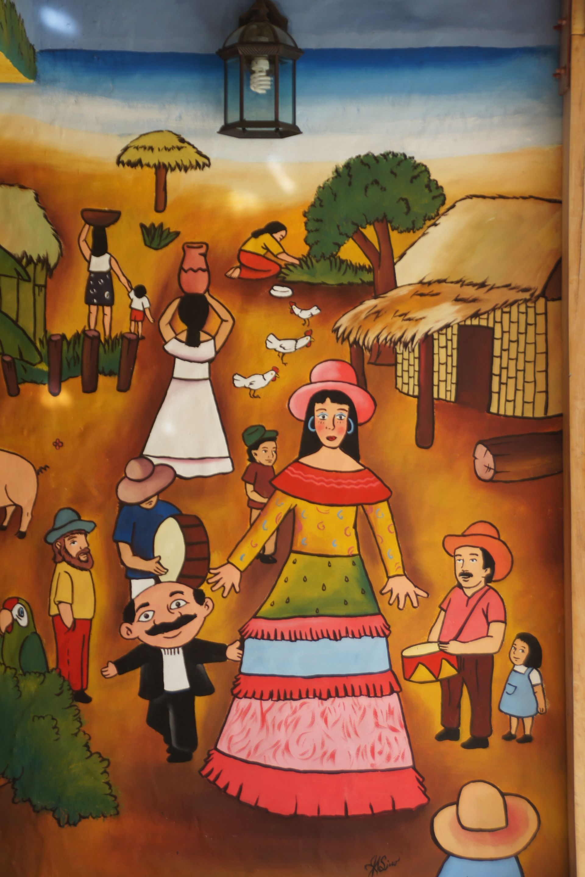 Colorful folk-art scene of musicians and dancers in a village street under a blue sky