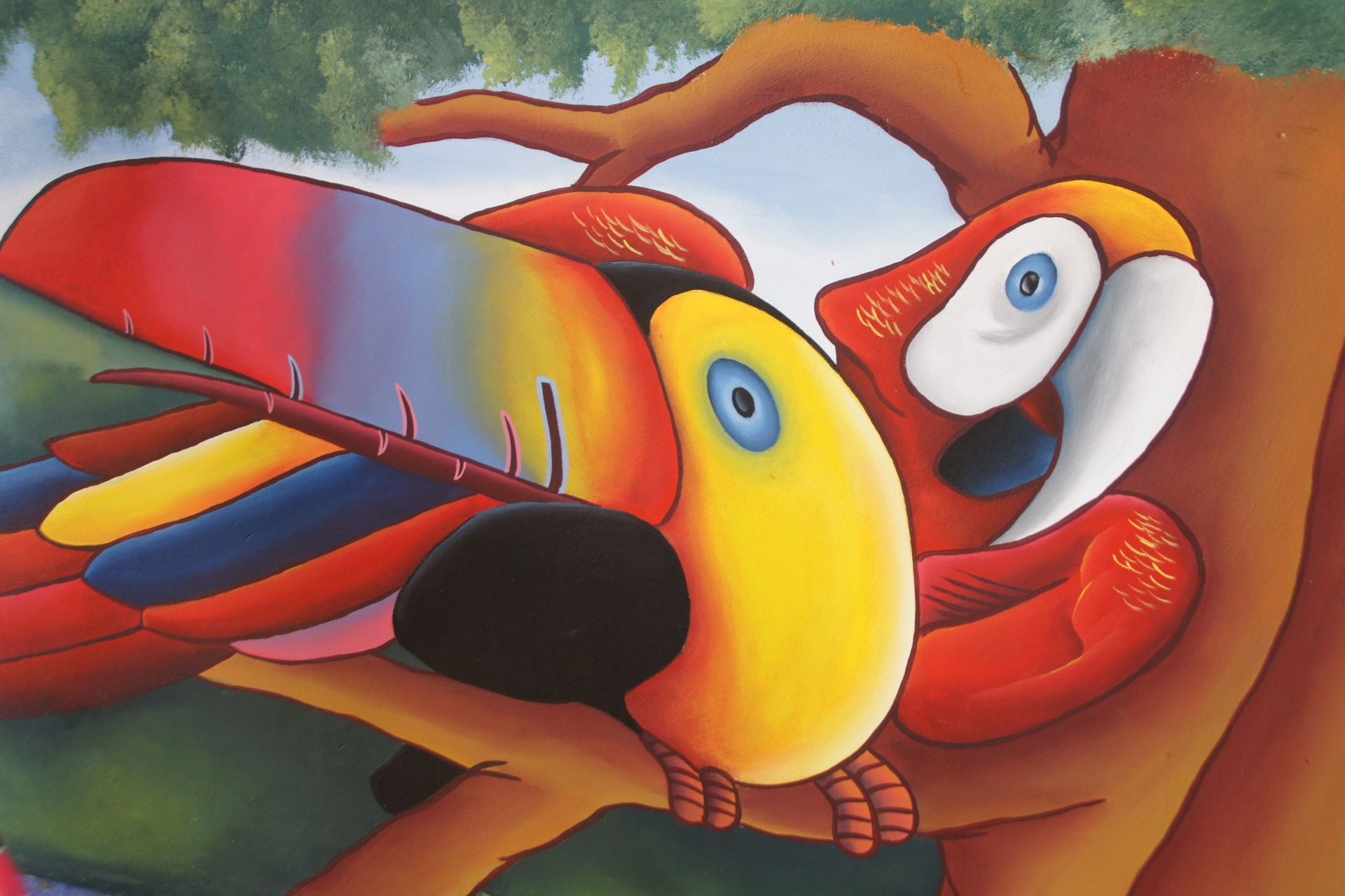 Colorful cartoon toucans with bright beaks and feathers, shown in a close-up embrace on a branch.