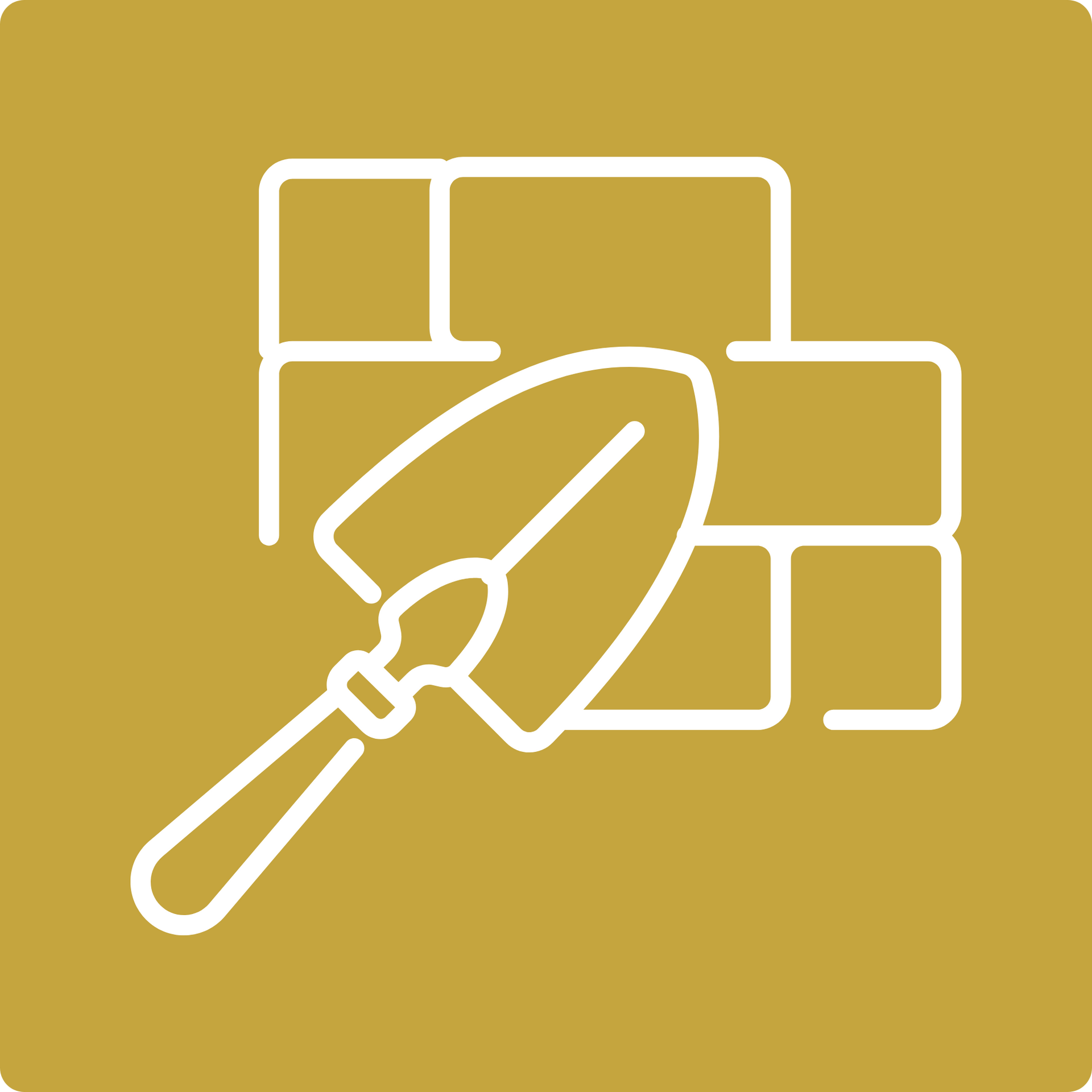 White garden trowel over stacked bricks on a mustard-yellow background