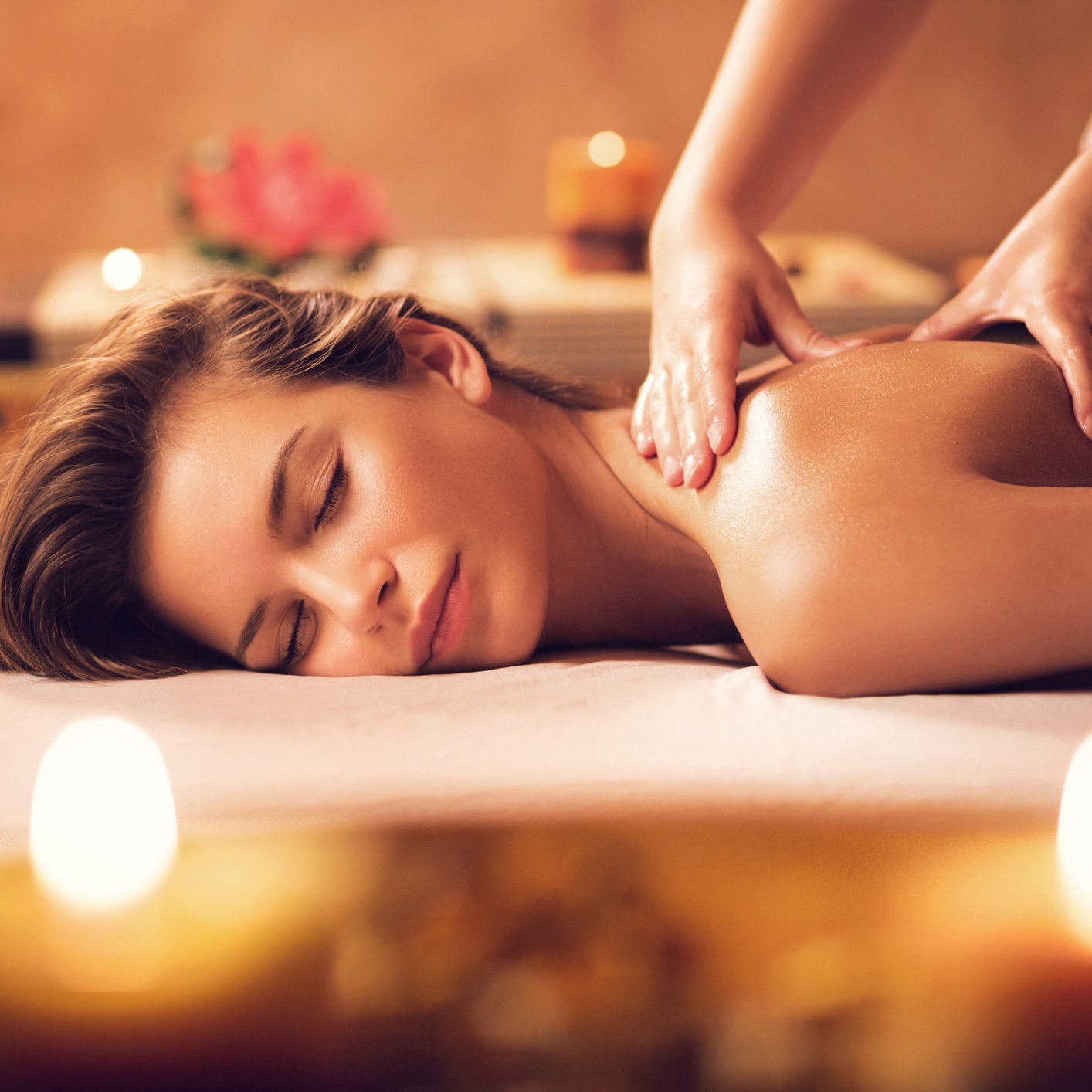 Woman Relaxing While Having a Massage — Florence, AL — Oasis Day Spa & Salon
