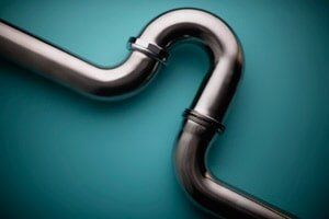 Plumbing Pipe — Plumbing Repair in Mcdonough, GA An image of residential pipes that needed emergency plumbing in McDonough, GA