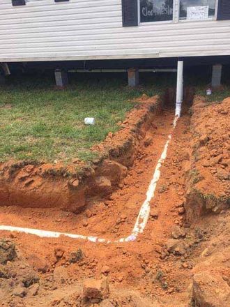 Waste Line Coming from Home to Septic Tank.