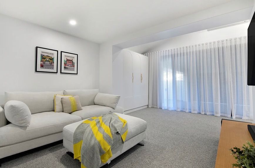 Modern Living Room With White Walls, Gray Carpe — Totally Flooring Gold Coast In Bundall, QLD