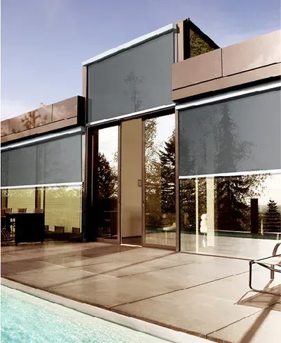 A White House With a Black Awning on the Side of It — Totally Flooring Gold Coast In Bundall, QLD