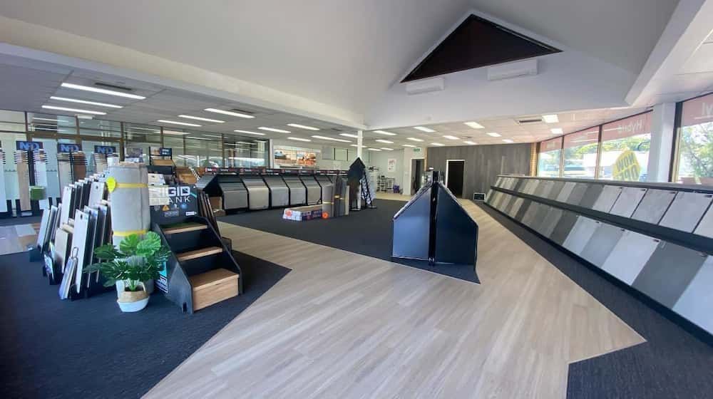 Modern Office Interior With Desks, Chairs, Plants — Totally Flooring Gold Coast In Bundall, QLD