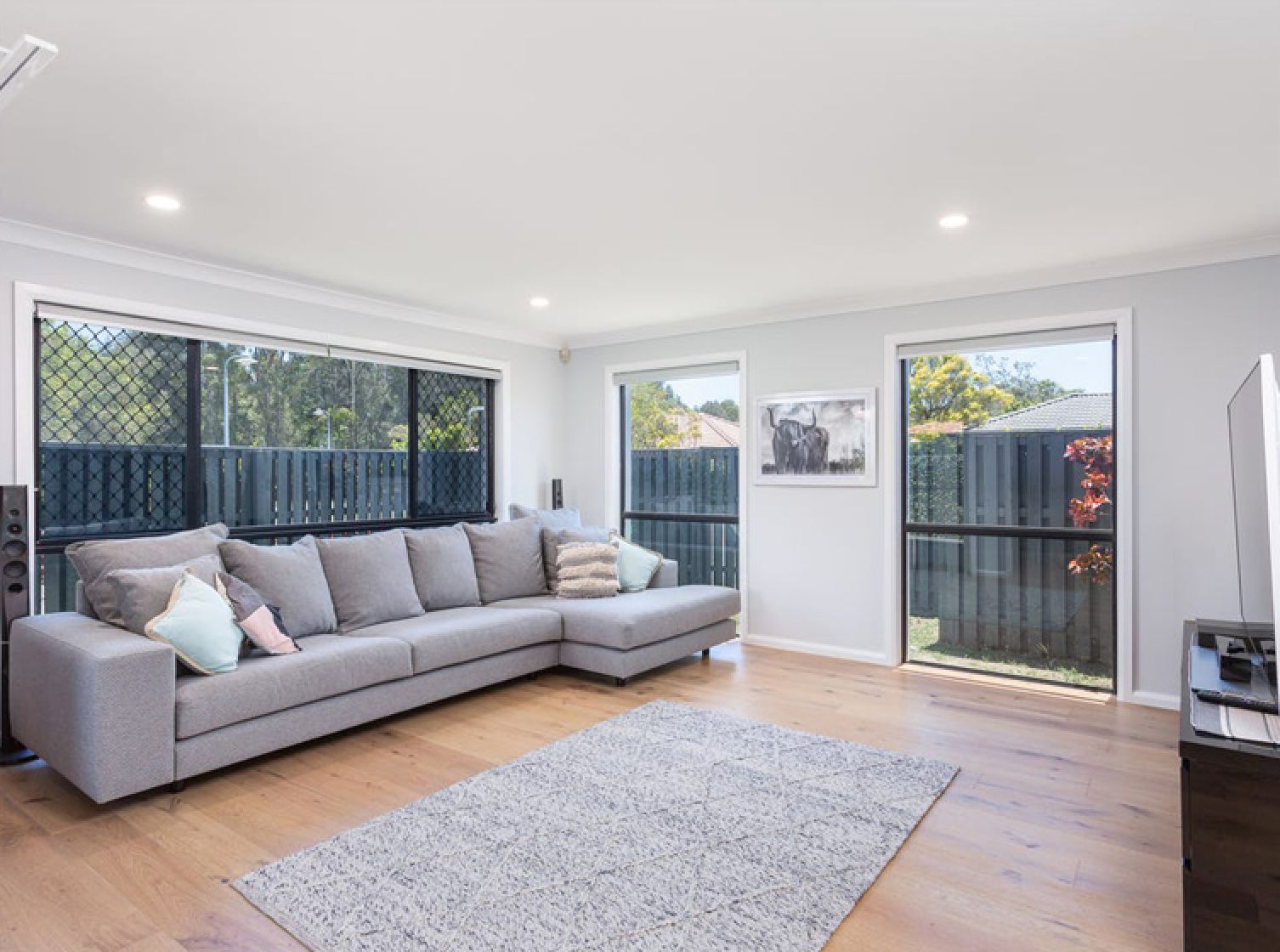 A stylish living room with timber-look tiling