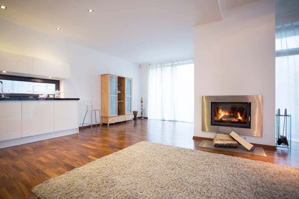 There is a Fireplace in the Middle of the Living Room — Totally Flooring Gold Coast In Bundall, QLD