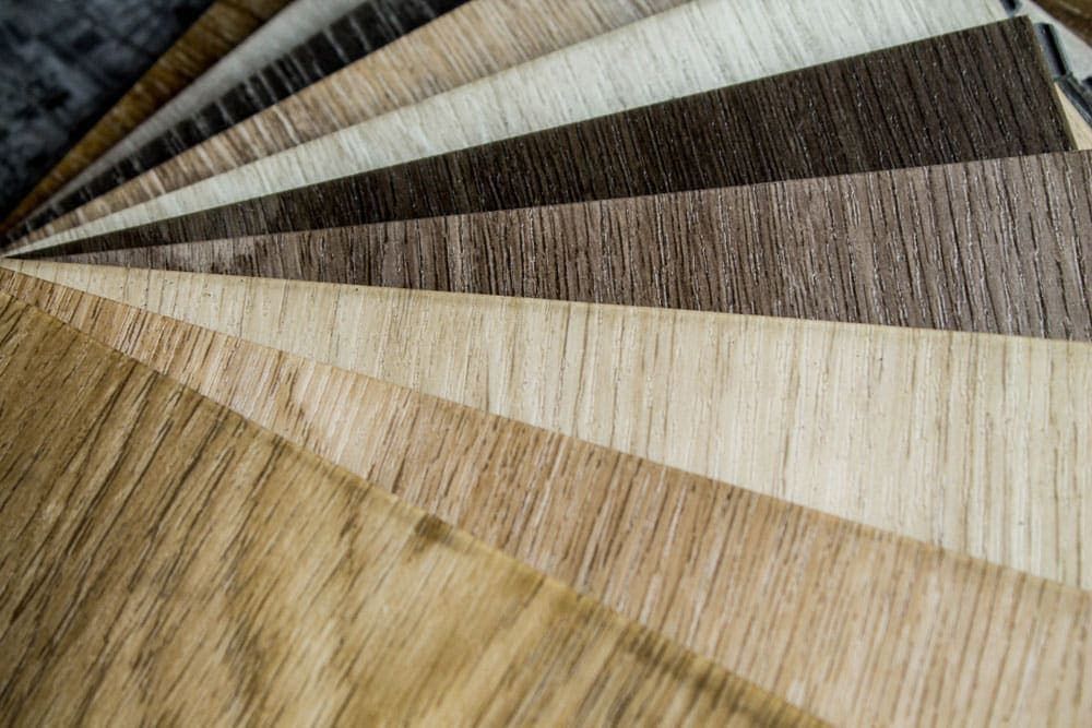 A Close Up of a Bunch of Different Types of Wood — Totally Flooring Gold Coast In Bundall, QLD