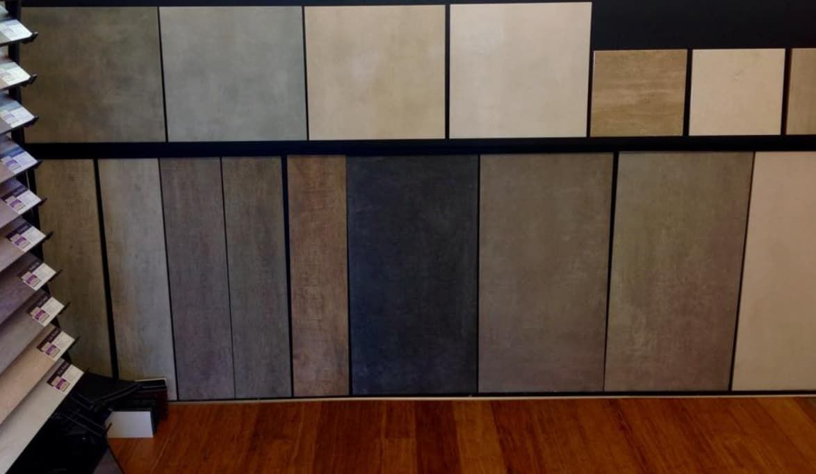 A Wall With a Lot of Tiles on It — Totally Flooring Gold Coast In Bundall, QLD