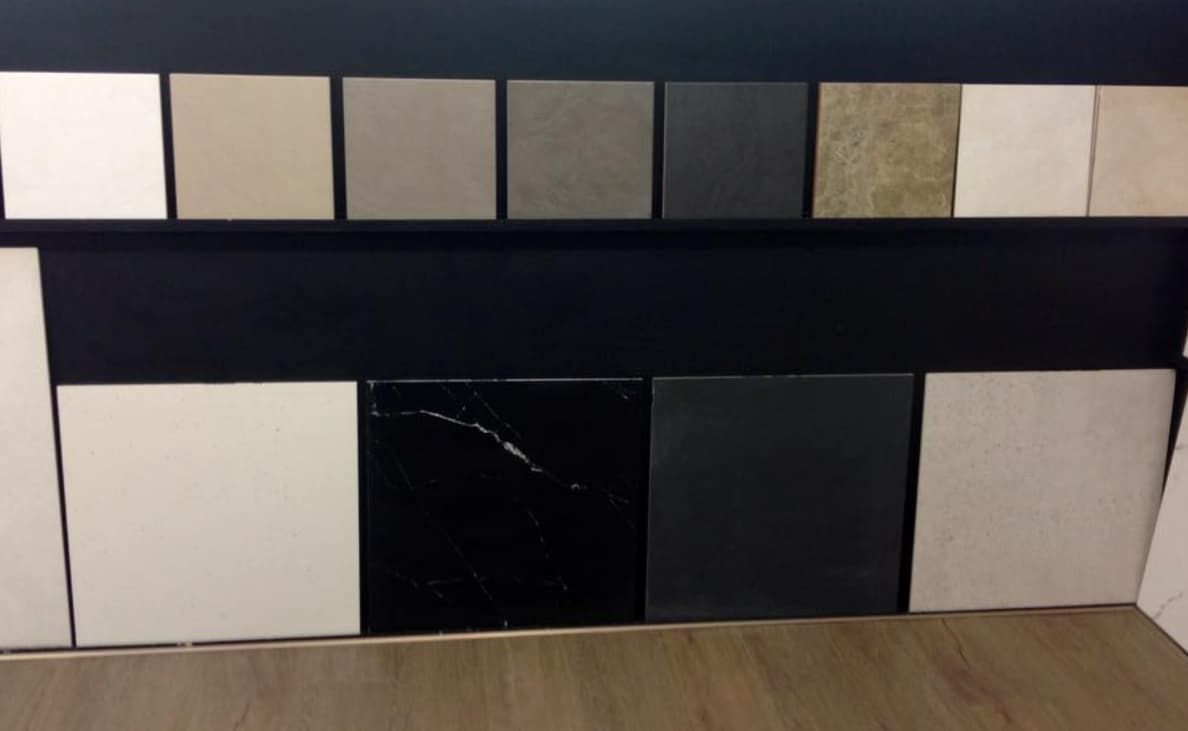 A Bunch of Tiles Are Lined Up on a Shelf — Totally Flooring Gold Coast In Bundall, QLD