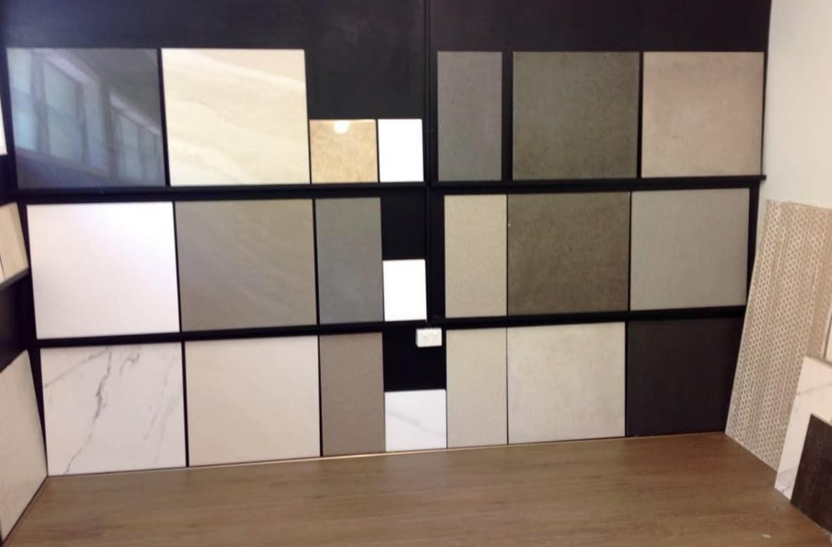 A Wall With a Lot of Tiles on It — Totally Flooring Gold Coast In Bundall, QLD