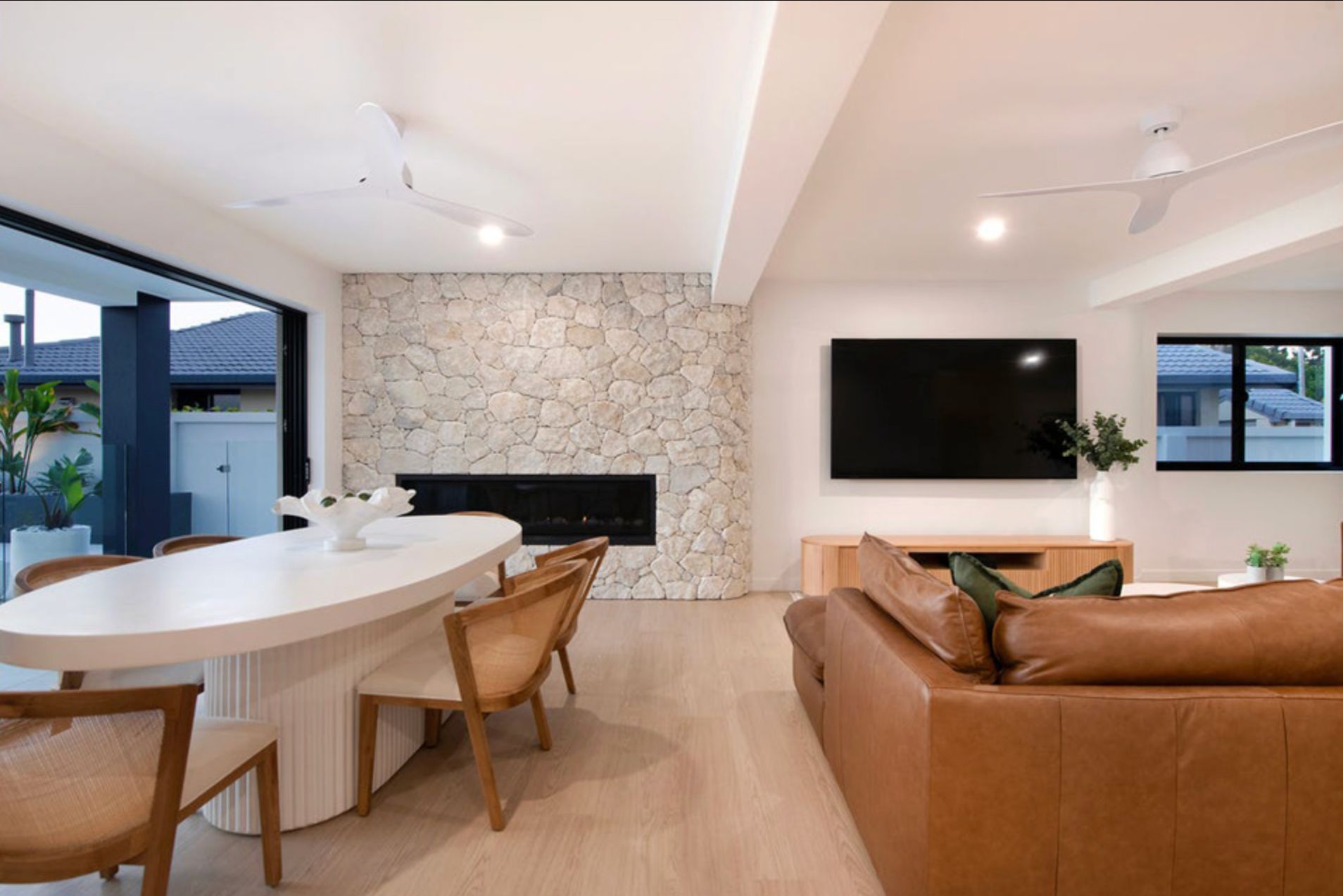 A living room with timber-look tiles
