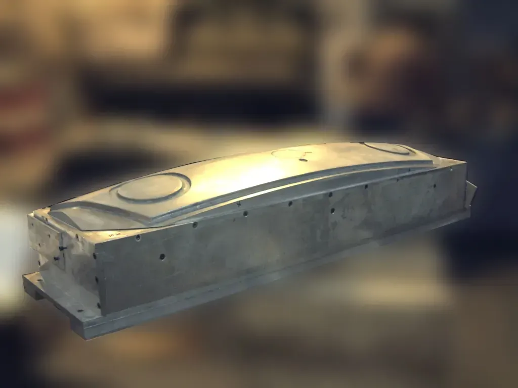 Rectangular metal enclosure with a rounded top, shown on a blurred background