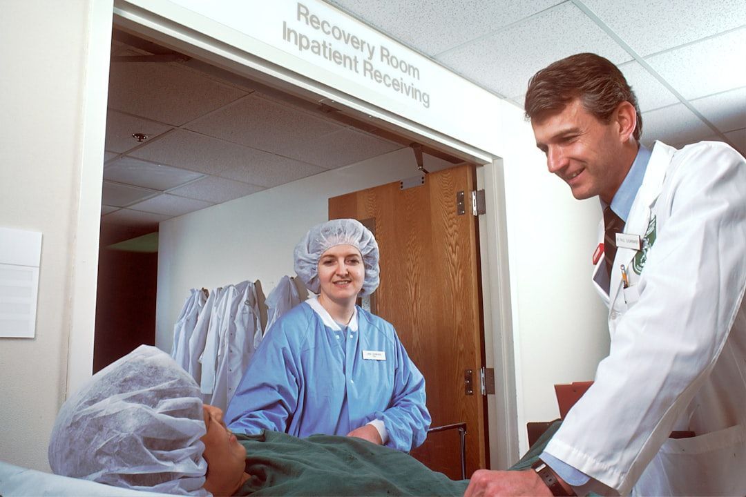 Medical professional consulting with an athlete about IV therapy - nad iv therapy for athletes