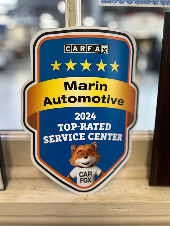 CARFAX 2024 Top-Rated Service Center plaque for Marin Automotive with Car Fox mascot | Marin Automotive