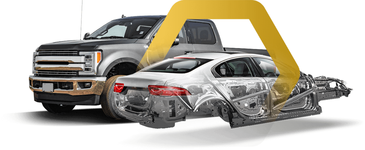 Car dealership logo over a pickup truck and damaged sedan, with a tow truck in the background