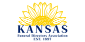 Kansas Funeral Directors Association logo with a yellow sunflower and blue text, Est. 1897