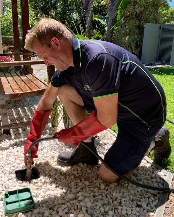 Pest Control Technician Applying Pesticides — Core Pest Management in Buderim, QLD