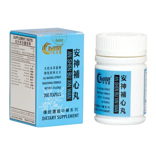 Blue-and-white bottle and box of Chinese herbal supplement with Chinese text.
