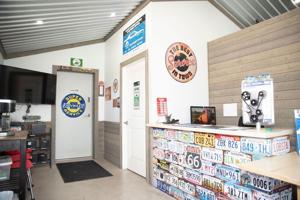 Small indoor shop with patriotic decor, counter display, and a door at the back