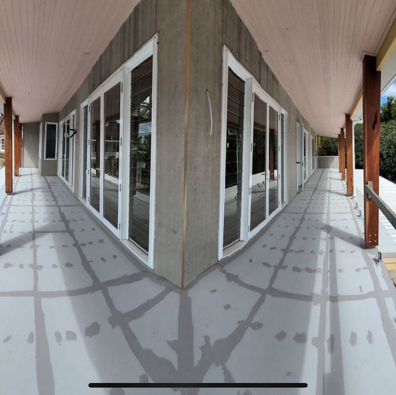 A Very Long Hallway With A Lot Of Windows — Coastwide Waterproofing in West Gosford, NSW