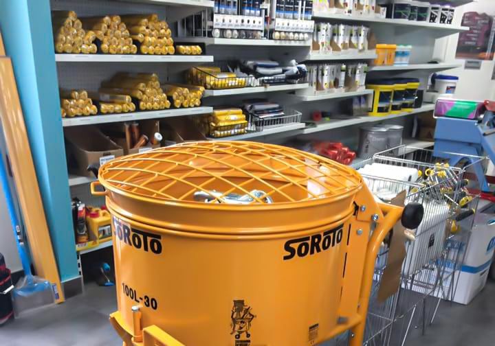 A Large Yellow Mixer Is Sitting In A Store — Coastwide Waterproofing in Central Coast, NSW