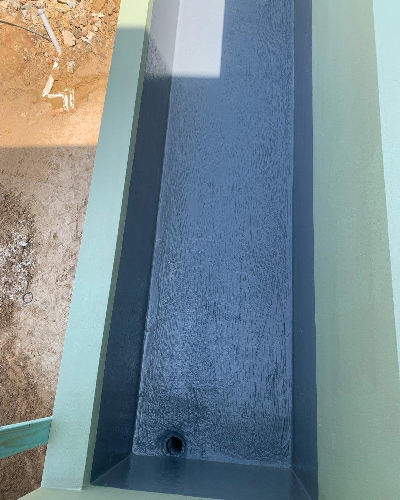 A Drain On The Side Of A Building With A Hole In It — Coastwide Waterproofing in West Gosford, NSW