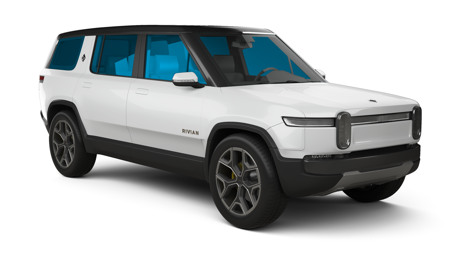White Rivian SUV with a black roof and tinted windows.