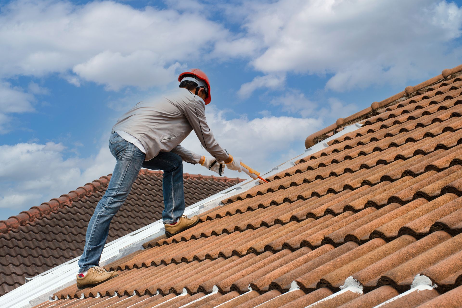 A man is working on the roof