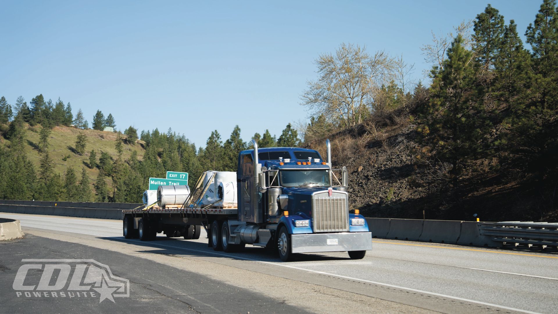 Semi truck hauling cylinders 
