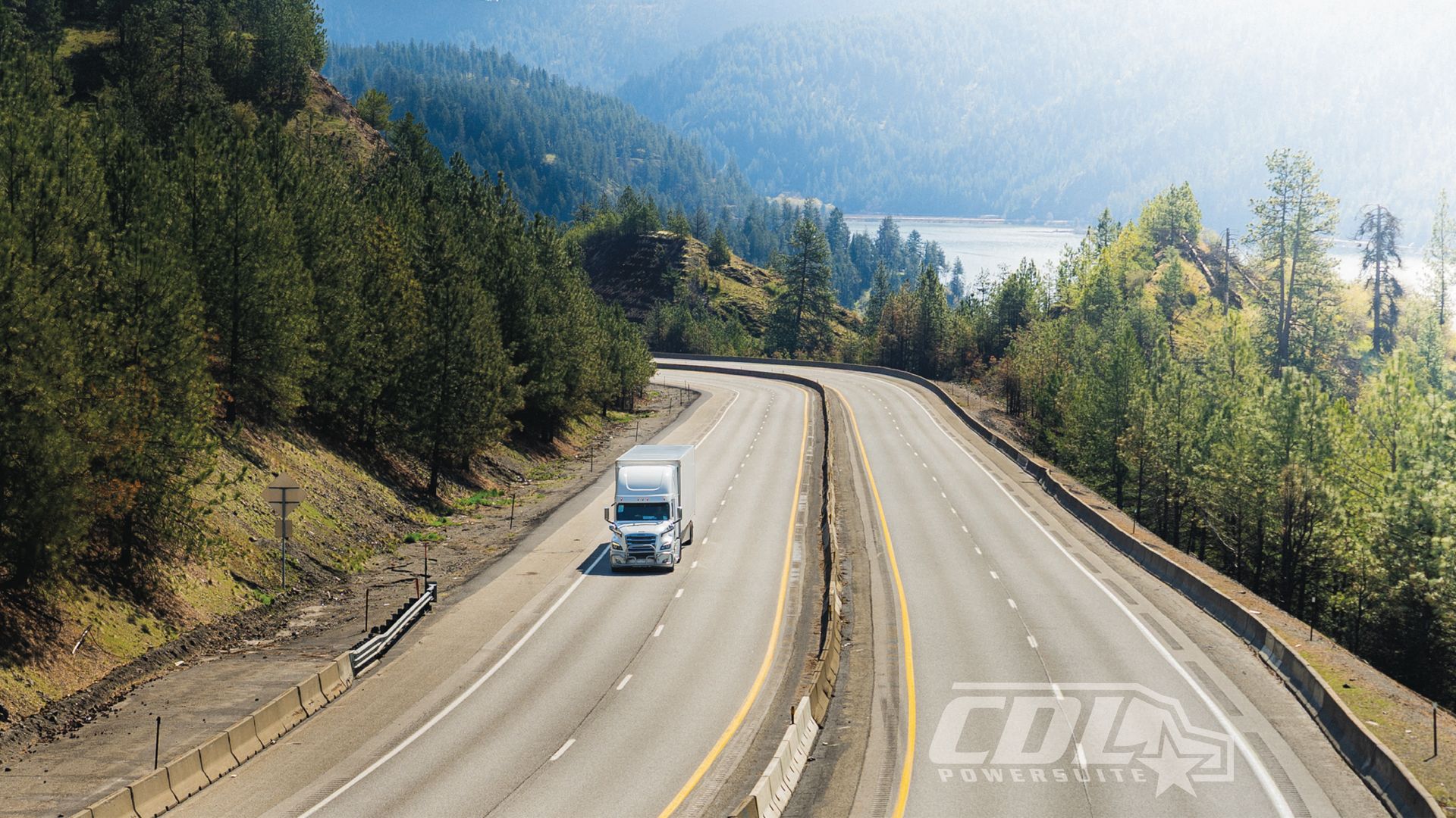 Semi Truck with lake in the background
